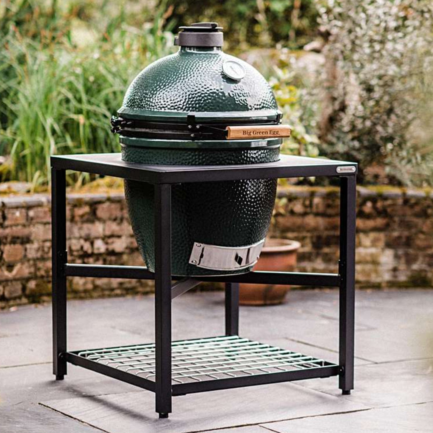 Elevate your grilling experience with the Big Green Egg Large Modular Nest System's advanced design
