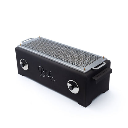 Black Blok Naka outdoor table grill for cooking and social events