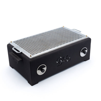 Blok Naka table grill in black for outdoor use and grilling